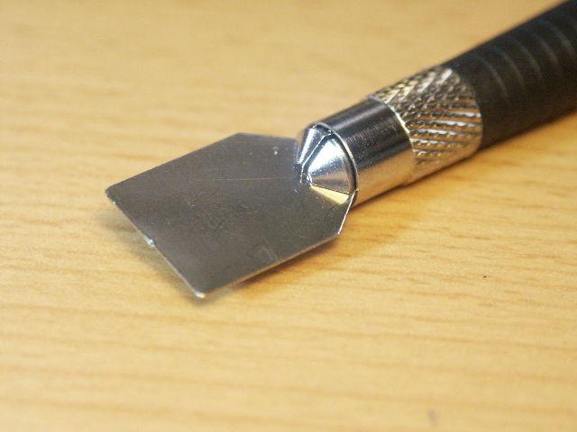 Racloir à pâte d'étain type 1